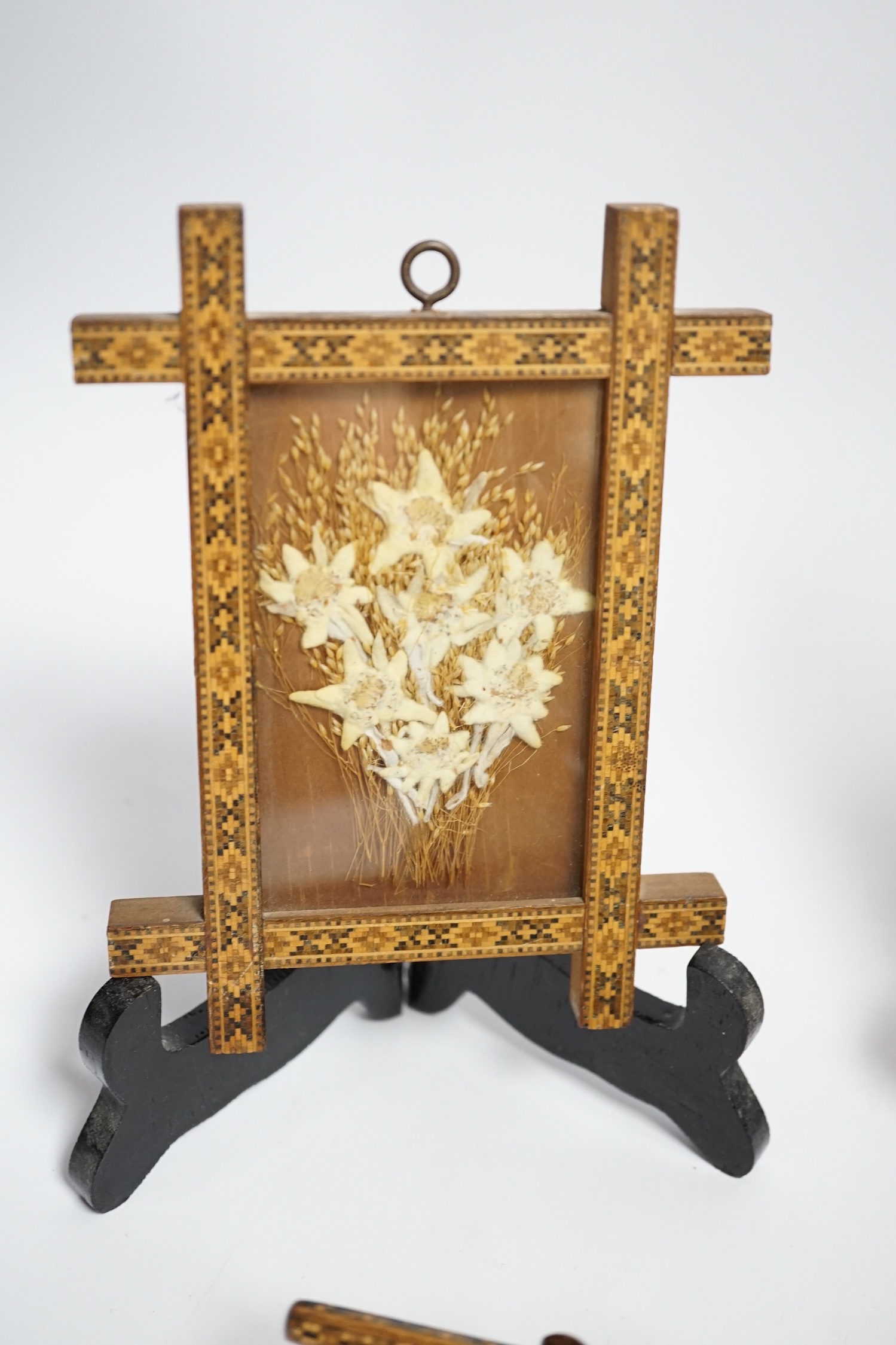A Tunbridge ware inkstand with cut glass bottle and pen, together with two frames, largest 22.5cm high